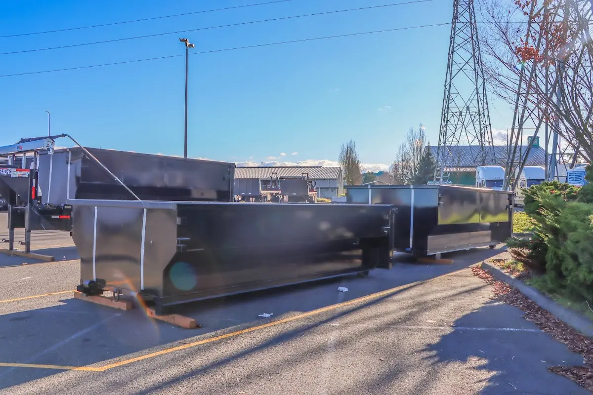 Roll-off dumpster ready for waste disposal at job site for Concrete Dumpster Rental in Salem